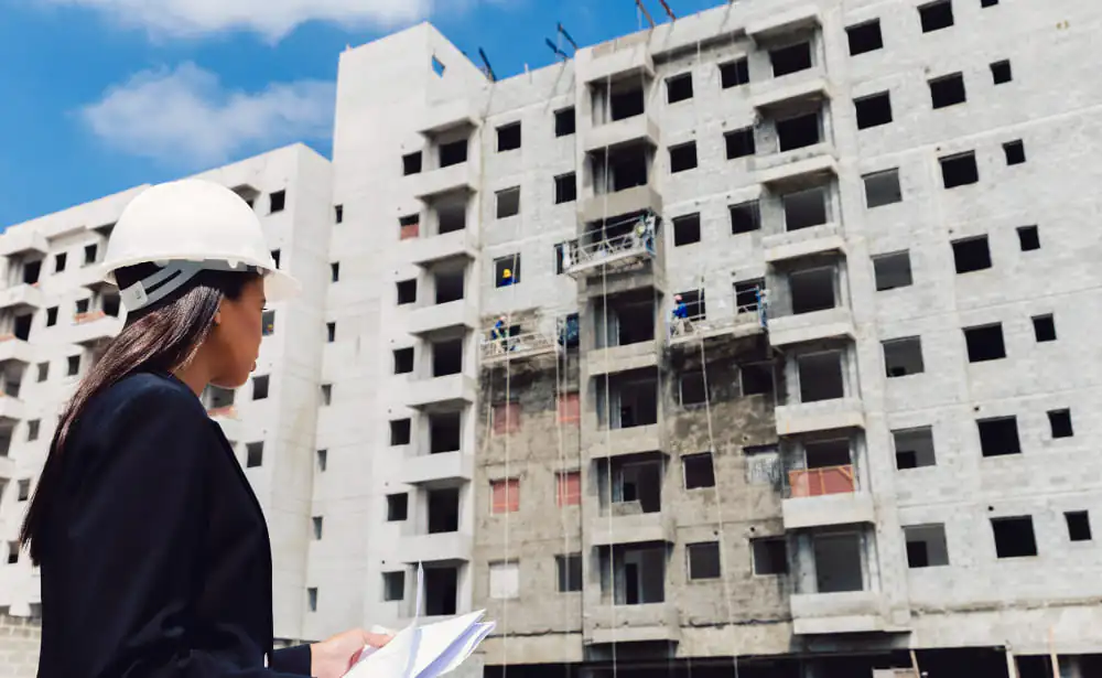 Luxury villa construction with blueprints